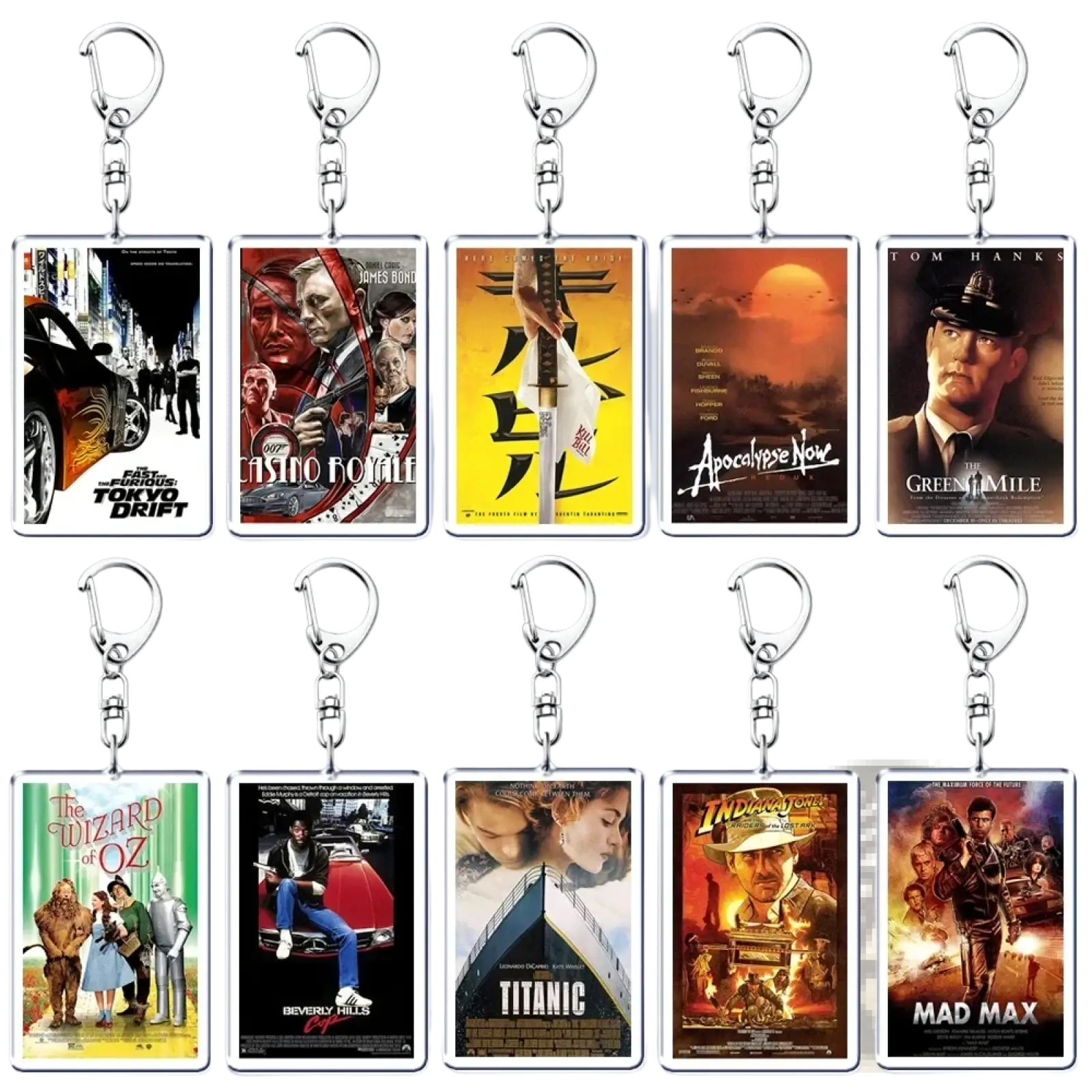 Set of ten rectangular acrylic movie poster keychains featuring colorful iconic film artwork for collectors