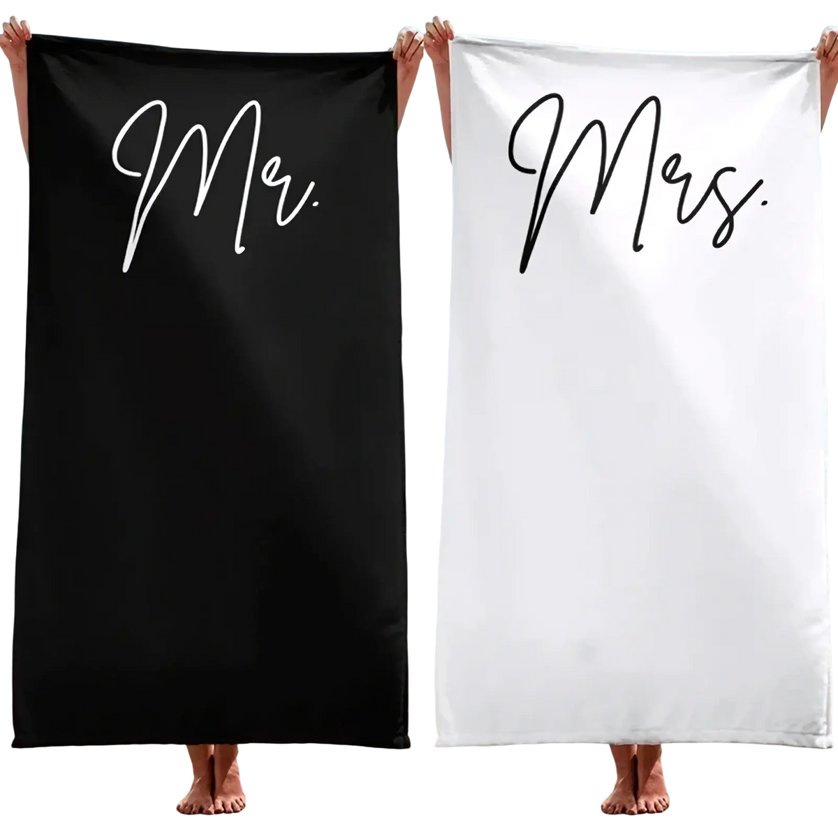 Black and white cotton beach towels with mr and mrs printed in elegant cursive for honeymoon wedding gift