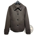 Mu&du gray herringbone wool coat with classic collar and black buttons hanging neatly on a hanger
