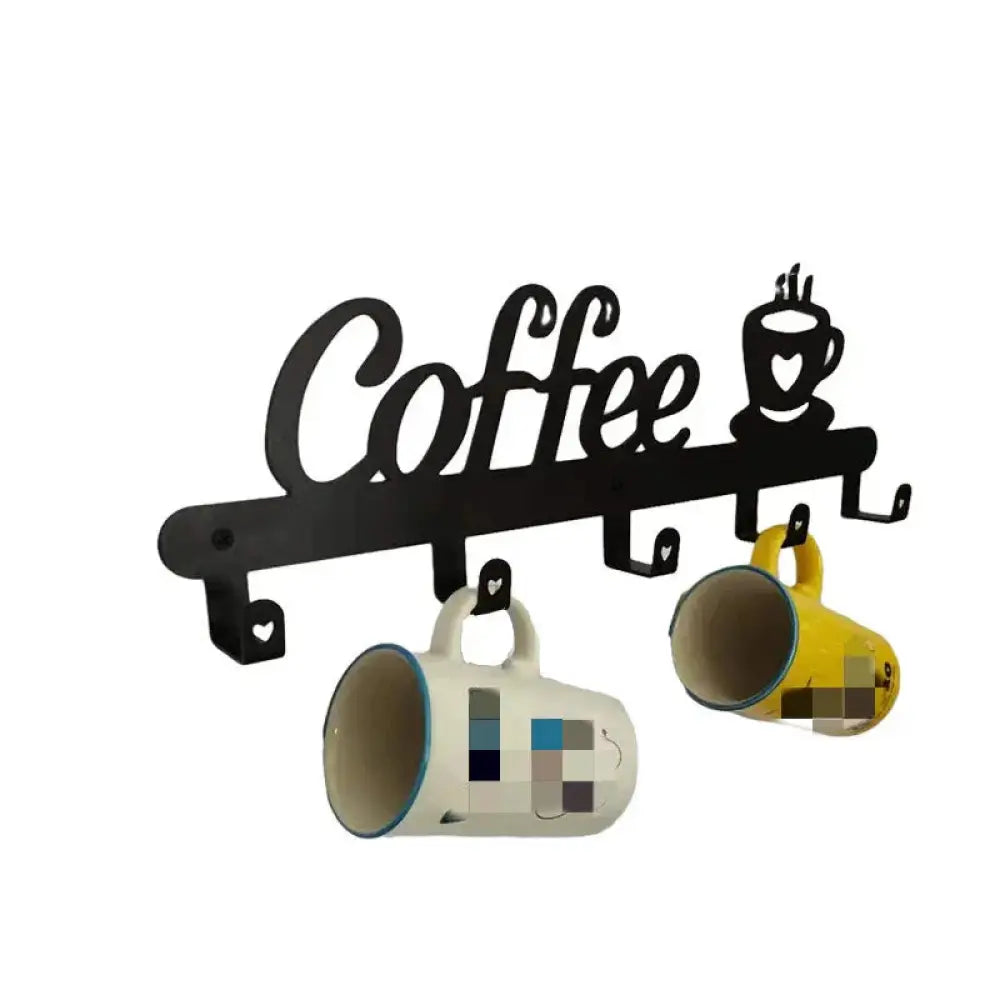 Modern black metal coffee mug wall rack with heart-shaped hooks for organizing cups in a kitchen or cafe setting