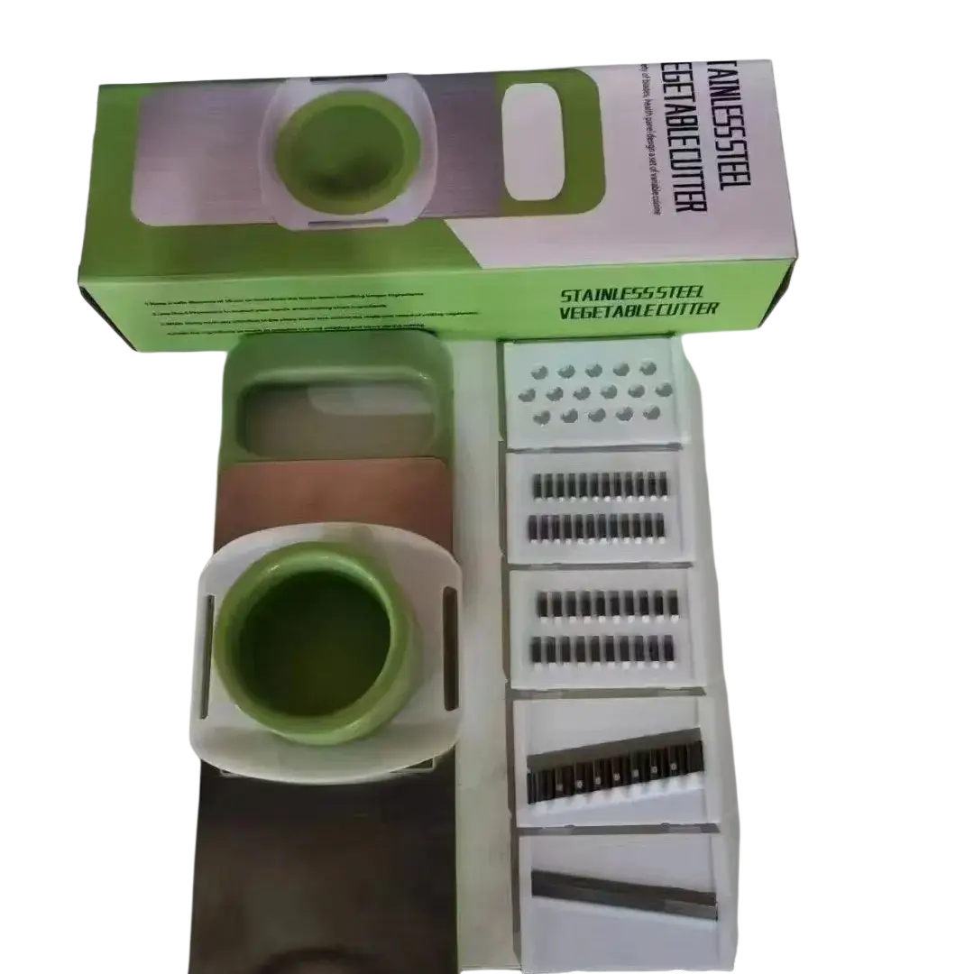 Green and white stainless steel multi-functional vegetable slicer shredder with interchangeable blades for easy cutting