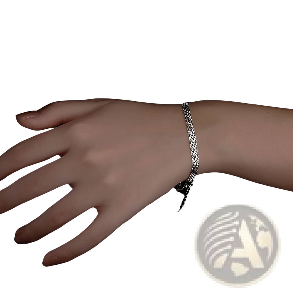 Multi-layer silver mesh bracelet with a delicate heart chain clasp made of silver for elegant wear