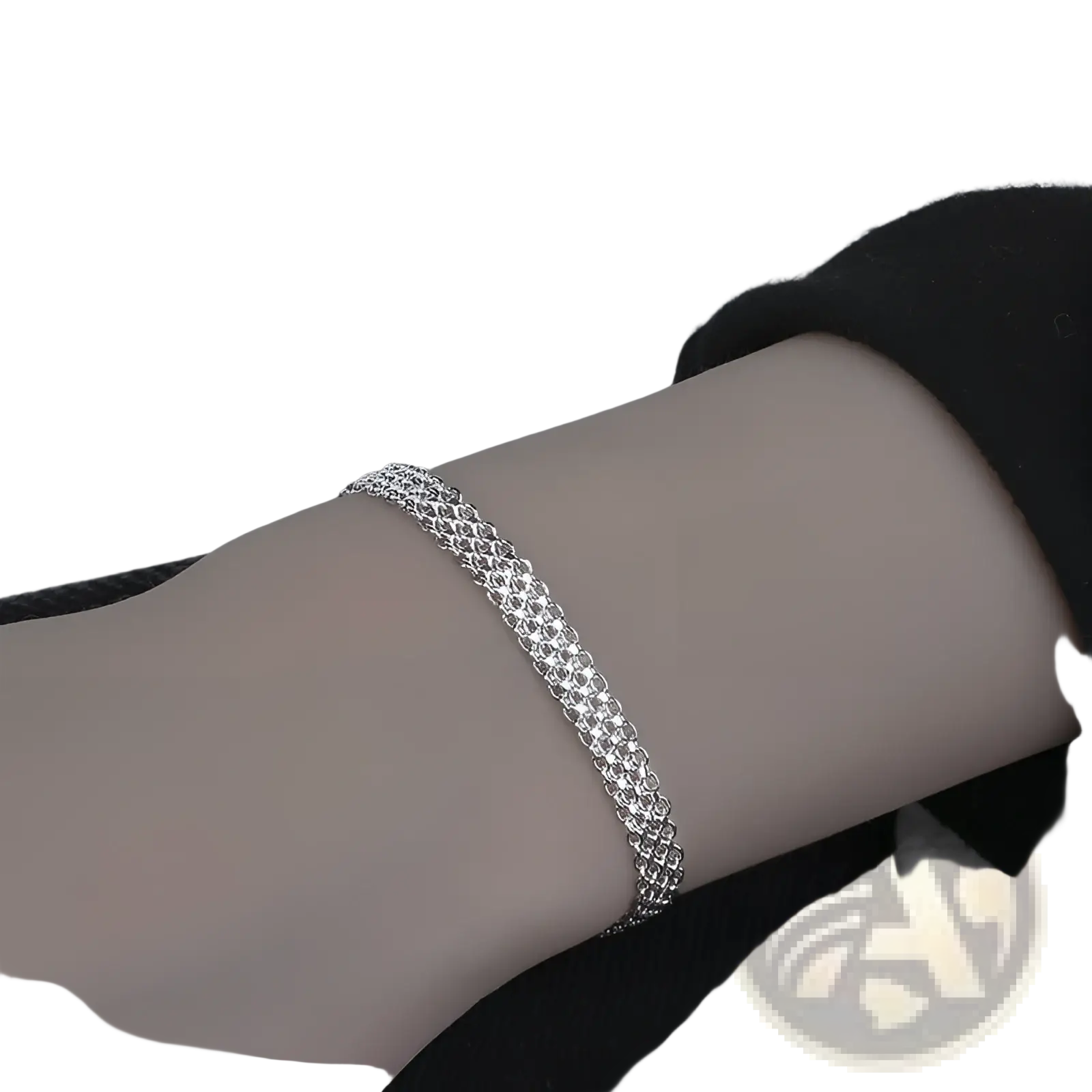 Multi-layer silver mesh bracelet with a delicate interwoven chain design and heart clasp in silver tone