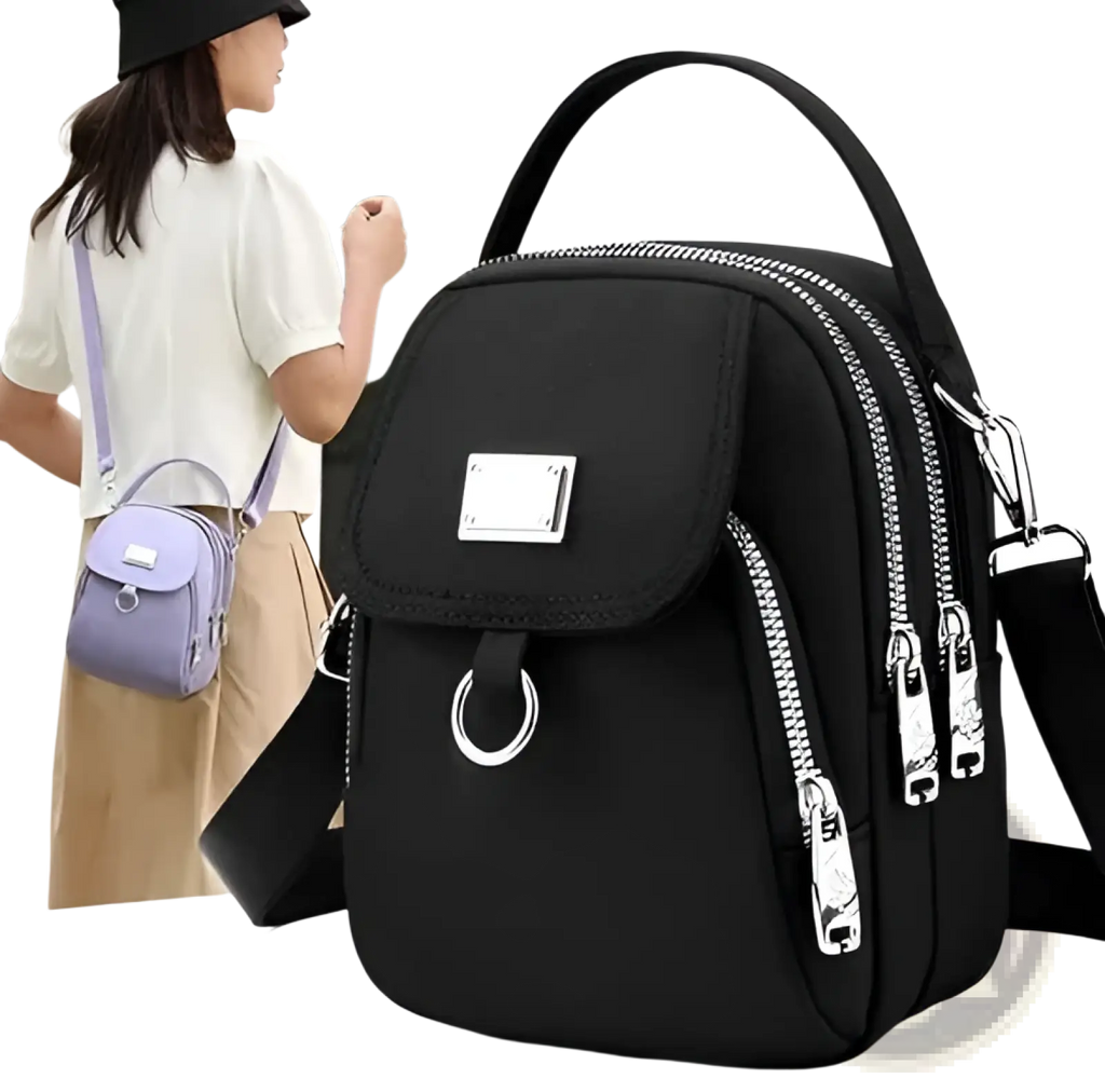 Black nylon multi pocket crossbody bag with silver zippers and earbud case attachment with metallic plate