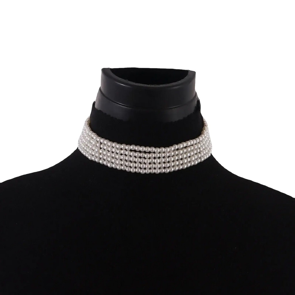Multi strand white pearl choker necklace featuring four rows of uniformly sized white pearls with subtle sheen