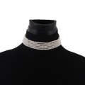 Multi strand white pearl choker necklace featuring four rows of uniformly sized white pearls with subtle sheen