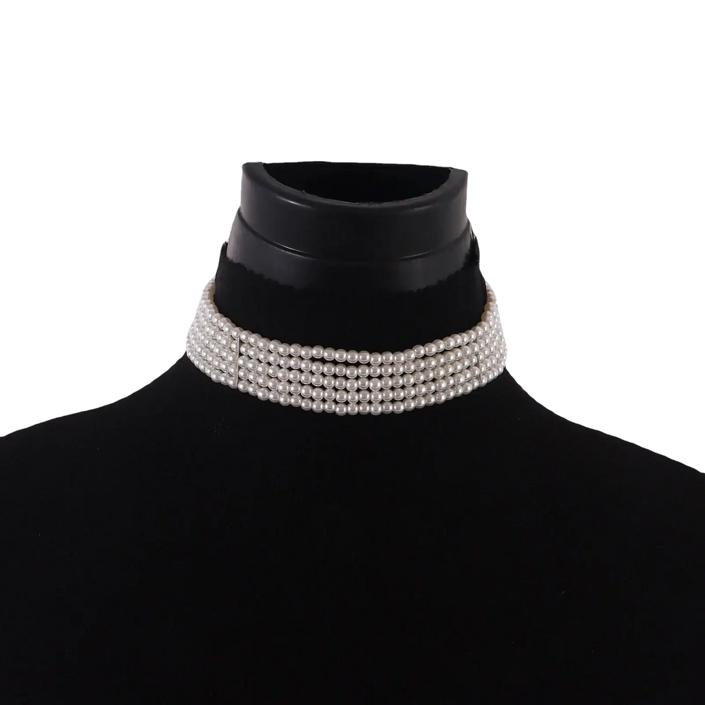 A multi strand white pearl choker necklace with four rows of uniformly sized lustrous pearls in a classic design