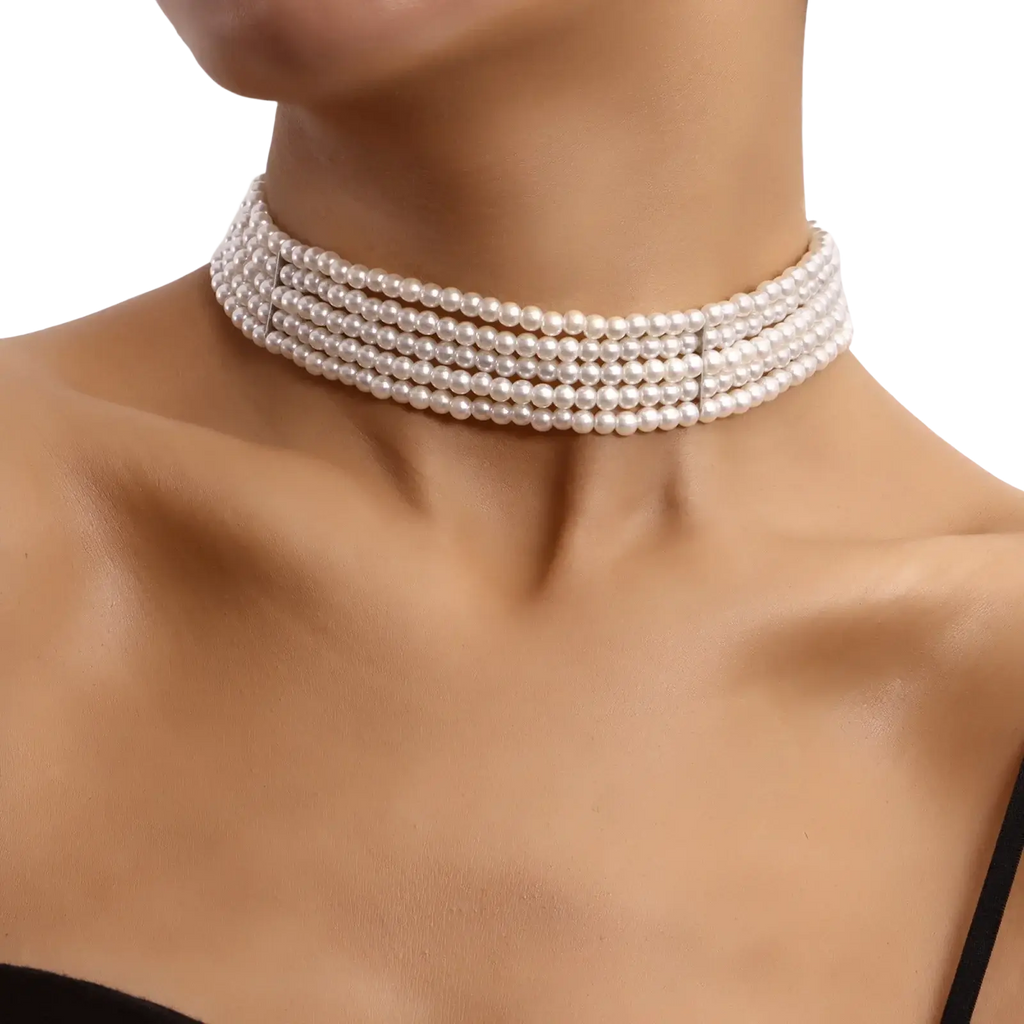 Multi strand white pearl choker necklace with four rows of uniform pearls and a sleek metallic clasp