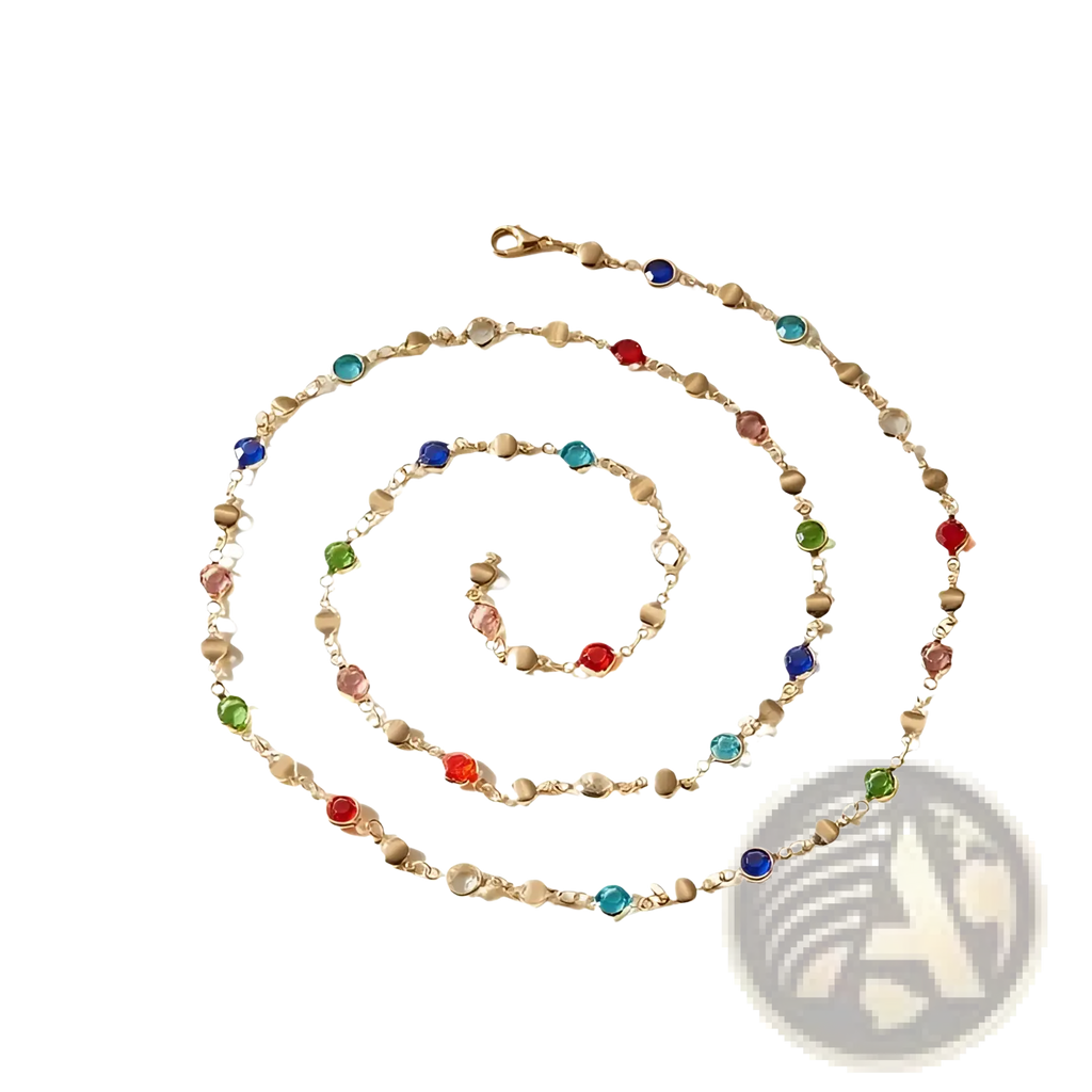 A gold pendant necklace with a spiral of multicolor faceted crystals in red blue green and pink hues