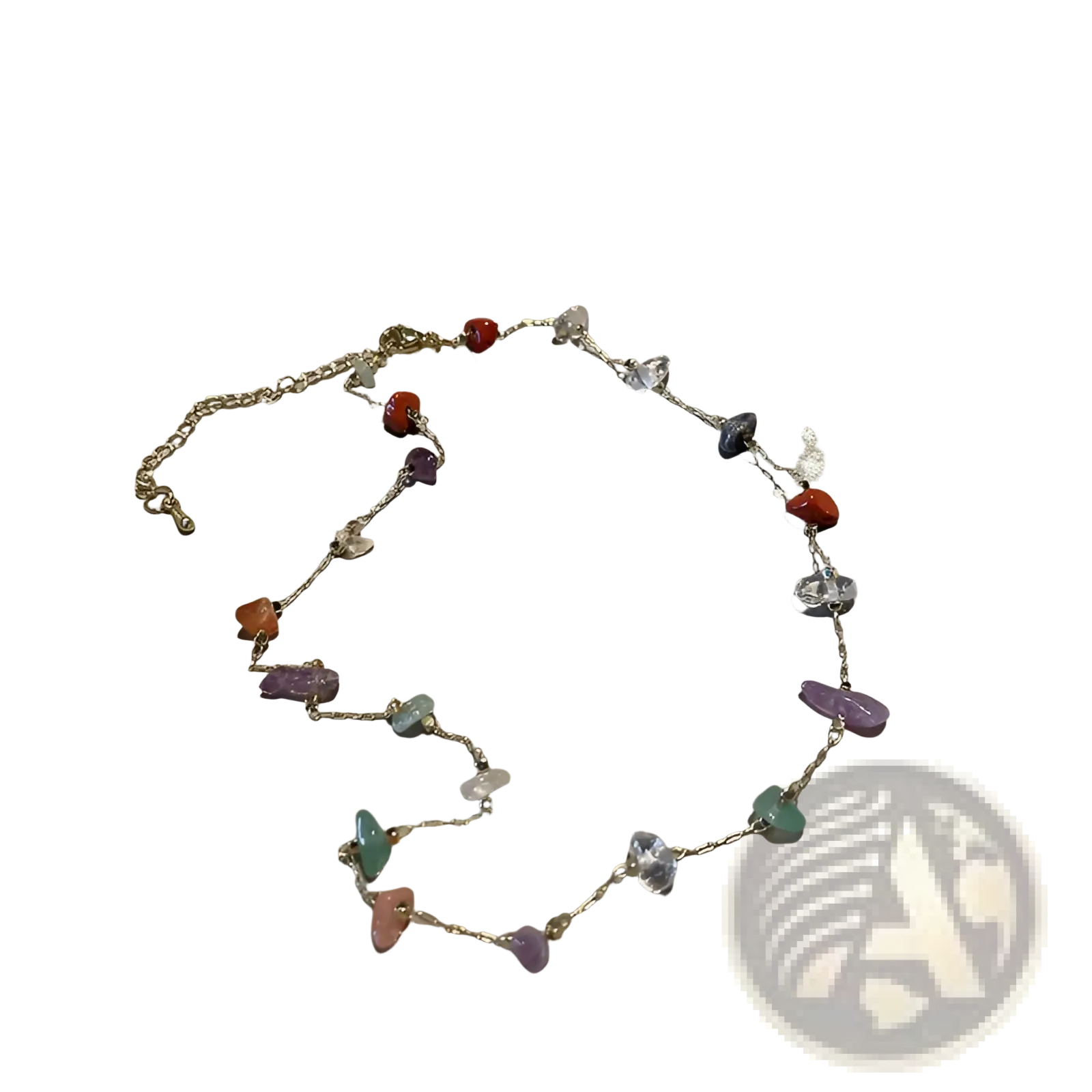 Multicolor gemstone choker in gold and silver alloy with irregular red purple green and clear stones on a silver chain