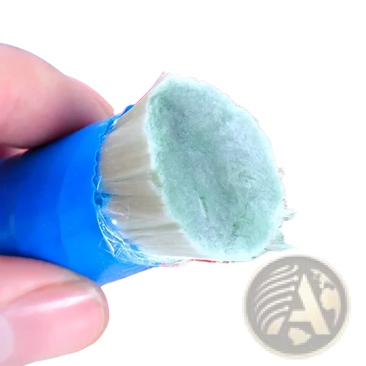 Multifunctional kitchen scrub brush with blue handle white bristles and fuzzy greenish-blue interior lining for pots and pans