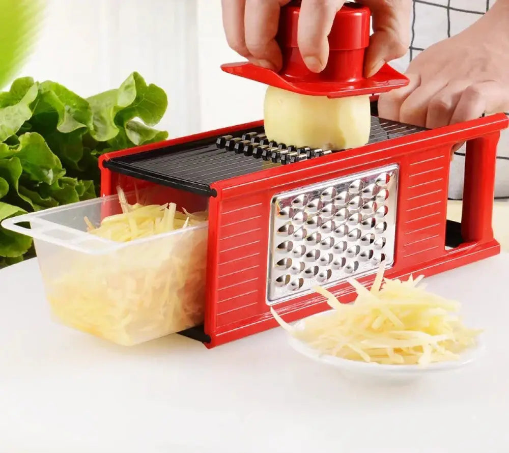 Multifunctional vegetable grater and slicer set with red plastic and stainless steel body with interchangeable blades for shredding slicing or dicing