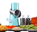 Light blue plastic multifunctional mandoline vegetable slicer and grater with interchangeable metal attachments