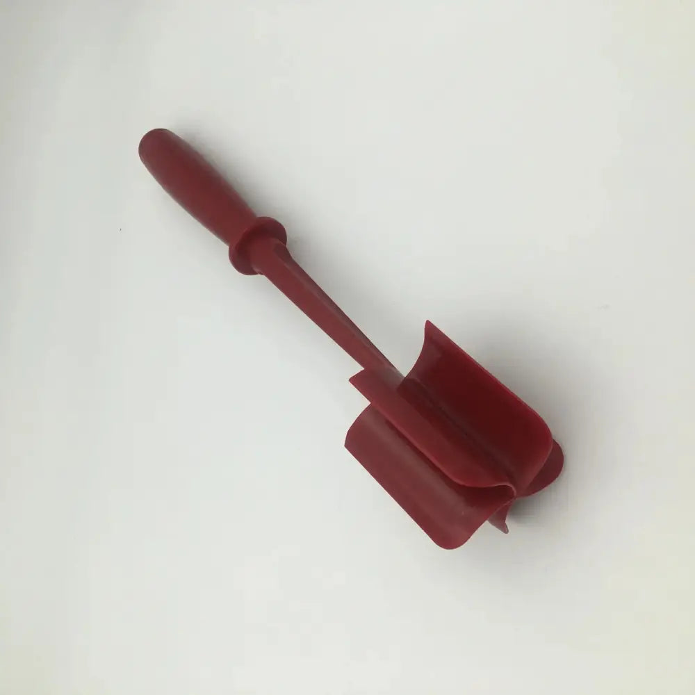 Heat resistant red nylon ground meat chopper with a rounded handle and flat slightly curved blade meat mallet