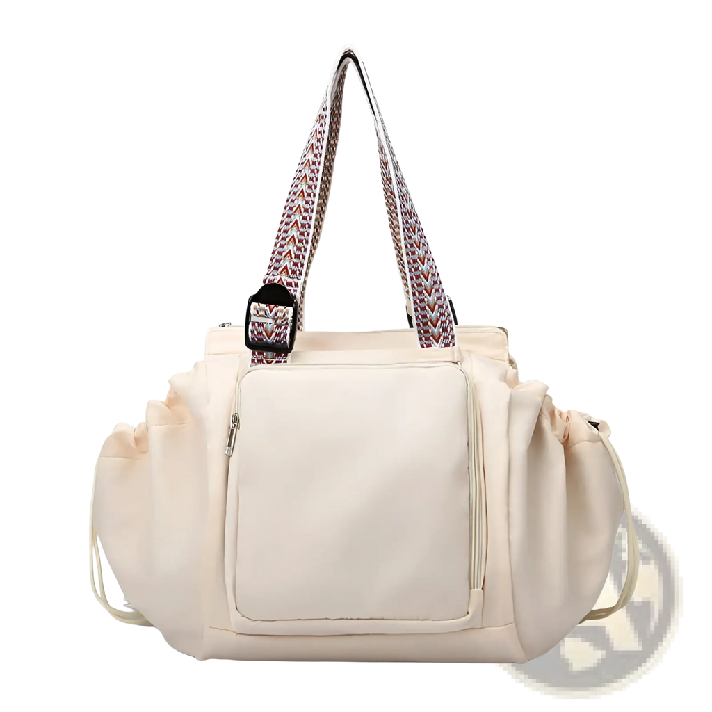 Cream-colored multifunctional waterproof nylon tote bag with patterned woven straps and a front zippered pocket