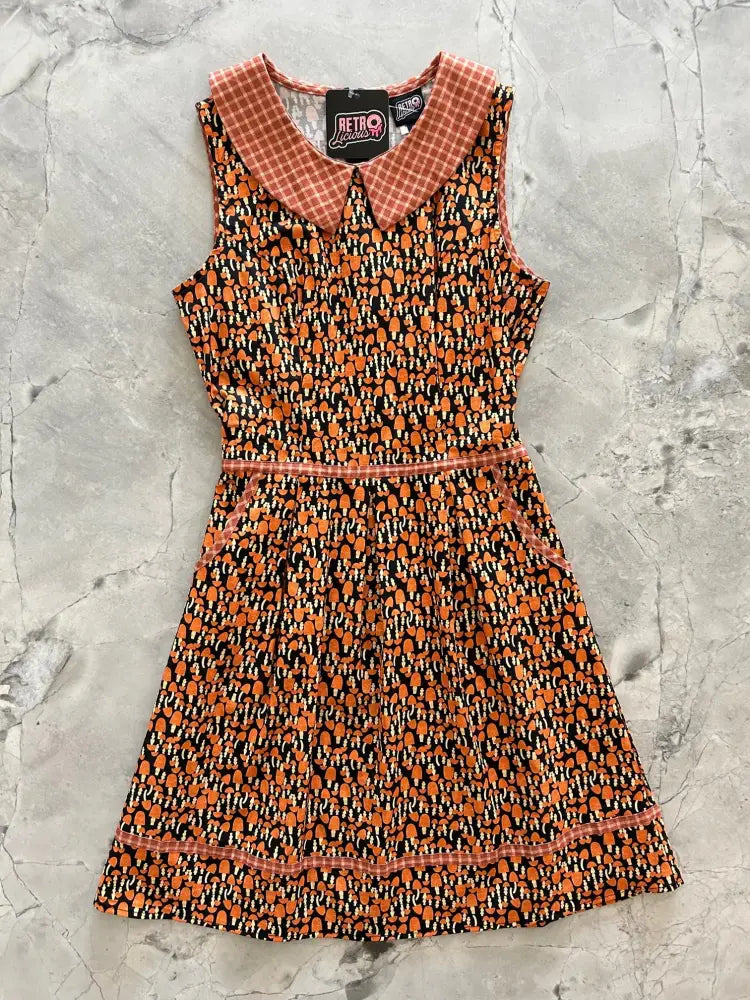 Retro 60s sleeveless orange and black patterned cotton dress with plaid collar and pumpkin motifs featuring pockets