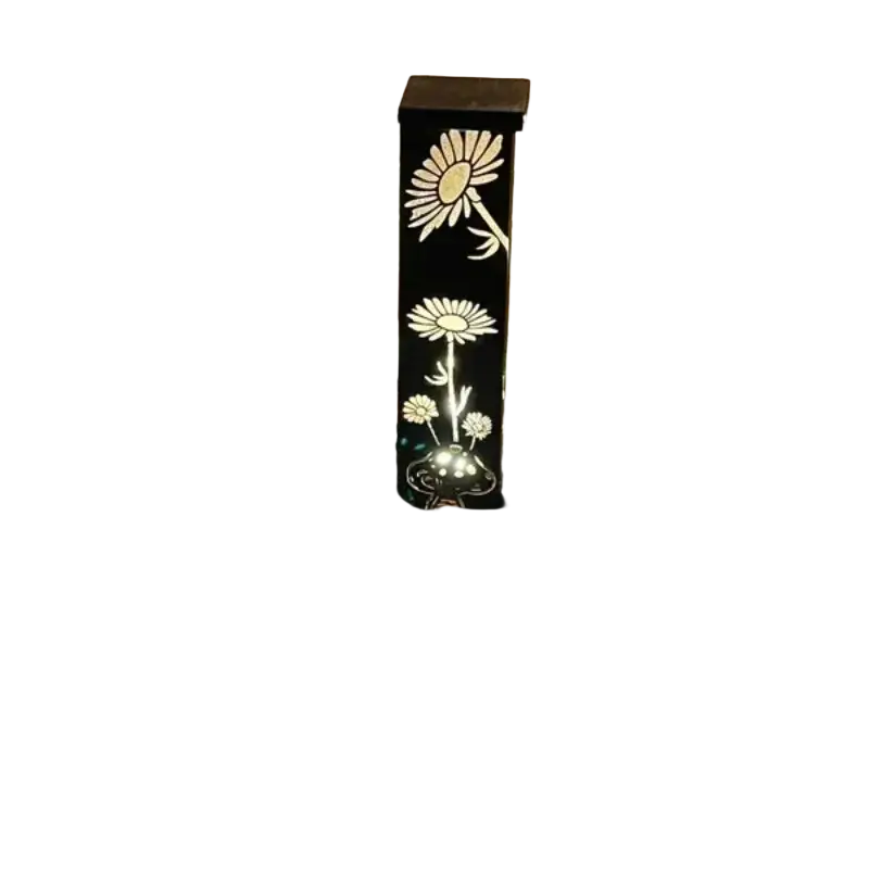 Black metal mushroom garden column with illuminated white daisy designs for outdoor garden column decoration