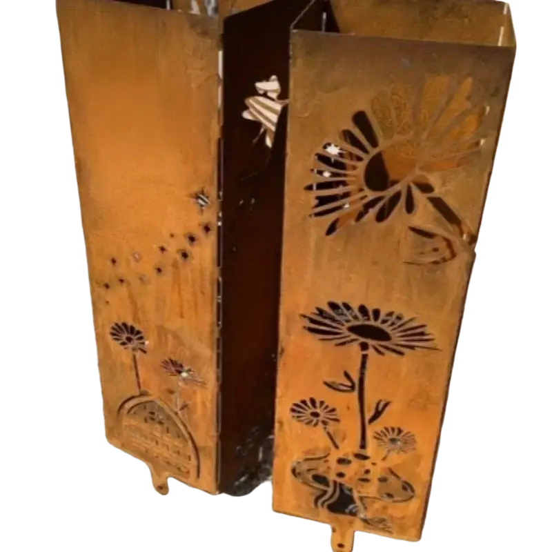 Rust-colored metal mushroom garden column with intricate floral cutouts and weathered finish for outdoor garden decor