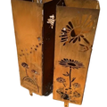 Rust-colored metal mushroom garden column with intricate floral cutouts and weathered finish for outdoor garden decor