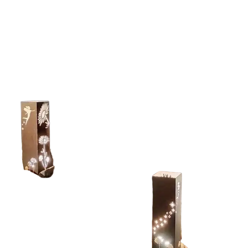 Rustic brown metal mushroom garden column lanterns with floral and fairy cut-out designs illuminated within