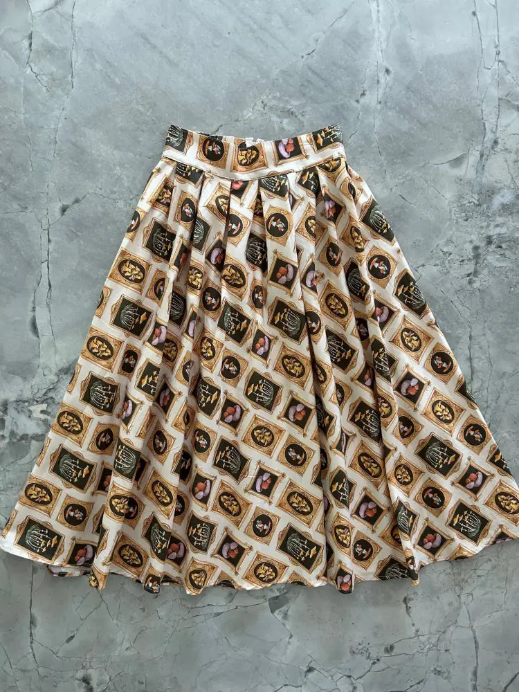 A beige vintage mushroom portrait print Doris flared cotton skirt with classical framed portraits in brown gold and pink tones