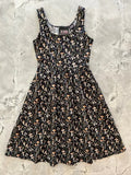 Black sleeveless vintage mushroom print cotton fit and flare dress with square neckline gathered waist and pockets