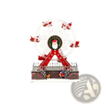 Musical christmas ferris wheel ornament in red and clear plastic featuring a central santa claus emblem
