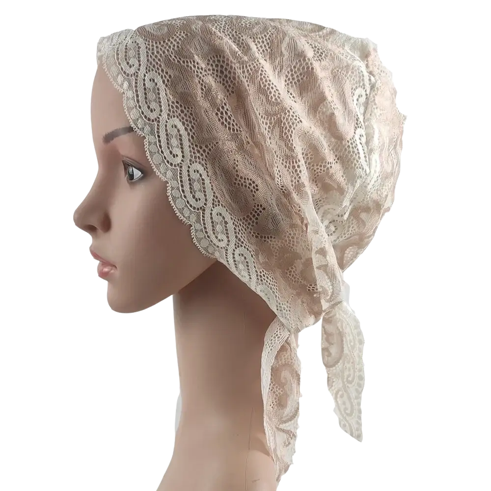 Beige lace Muslim turban lace cap with intricate swirling patterns and delicate sheer texture for chemo headwear