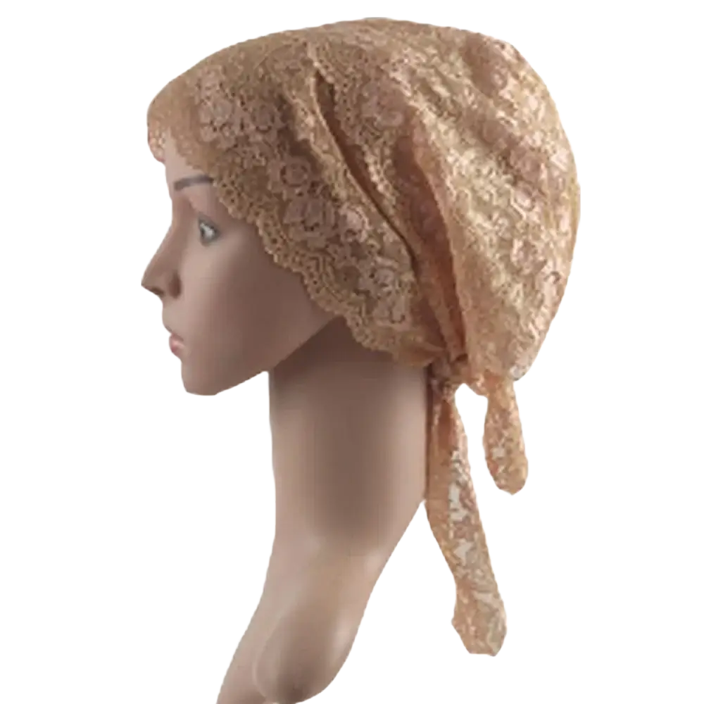 A delicate gold lace muslim turban lace cap with intricate floral patterns tied at the back for chemo headwear