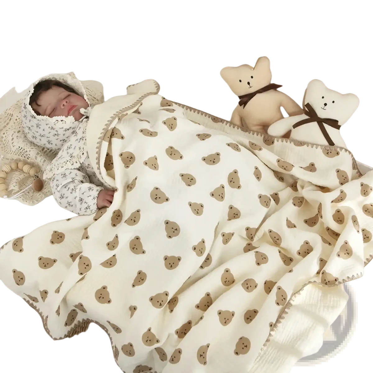 Cream-colored muslin cotton baby swaddle blanket with brown teddy bear faces soft fabric and decorative stitching edges