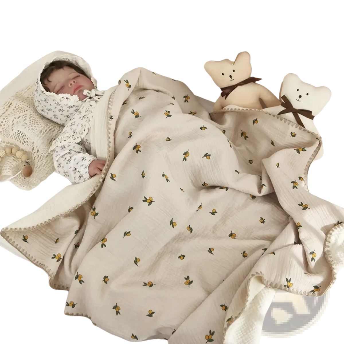 Muslin cotton baby swaddle blanket in soft cream with yellow citrus fruit pattern and green stems, with woven trim