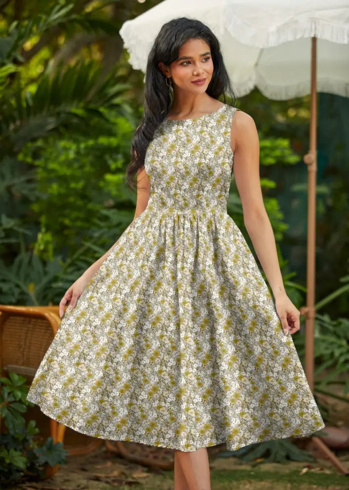 Sleeveless vintage mustard floral cotton midi dress with fitted bodice flared skirt light green and white pattern with pockets