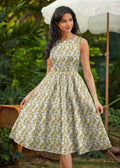 Sleeveless vintage mustard floral cotton midi dress with fitted bodice flared skirt light green and white pattern with pockets