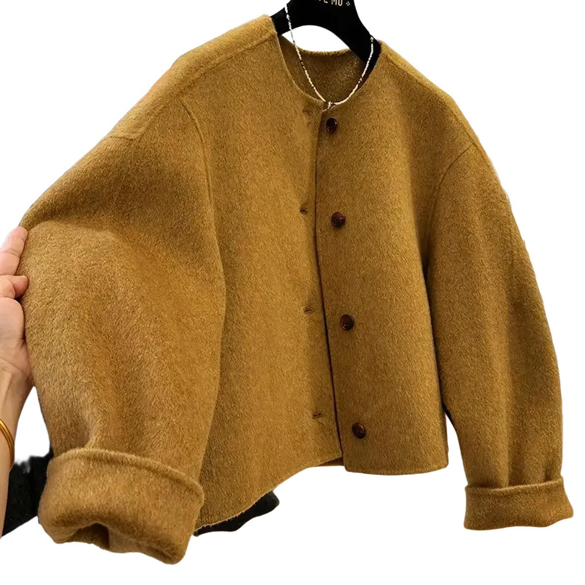 A cozy mustard yellow wool blend short coat for women featuring dark brown buttons and rolled cuffs