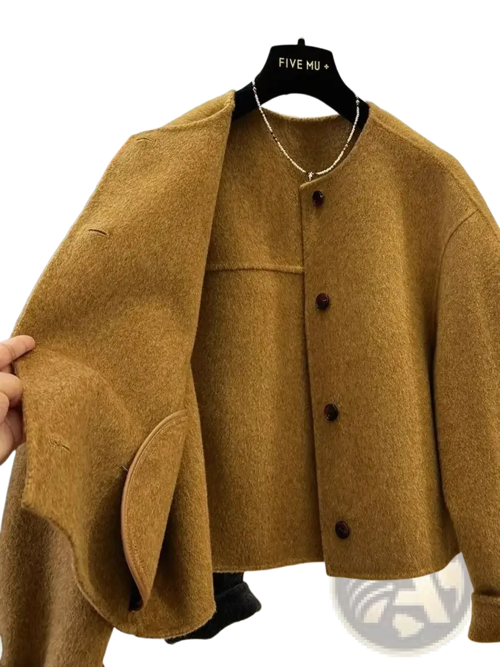 A warm camel-colored wool blend short coat for women with a soft textured finish and dark brown buttons