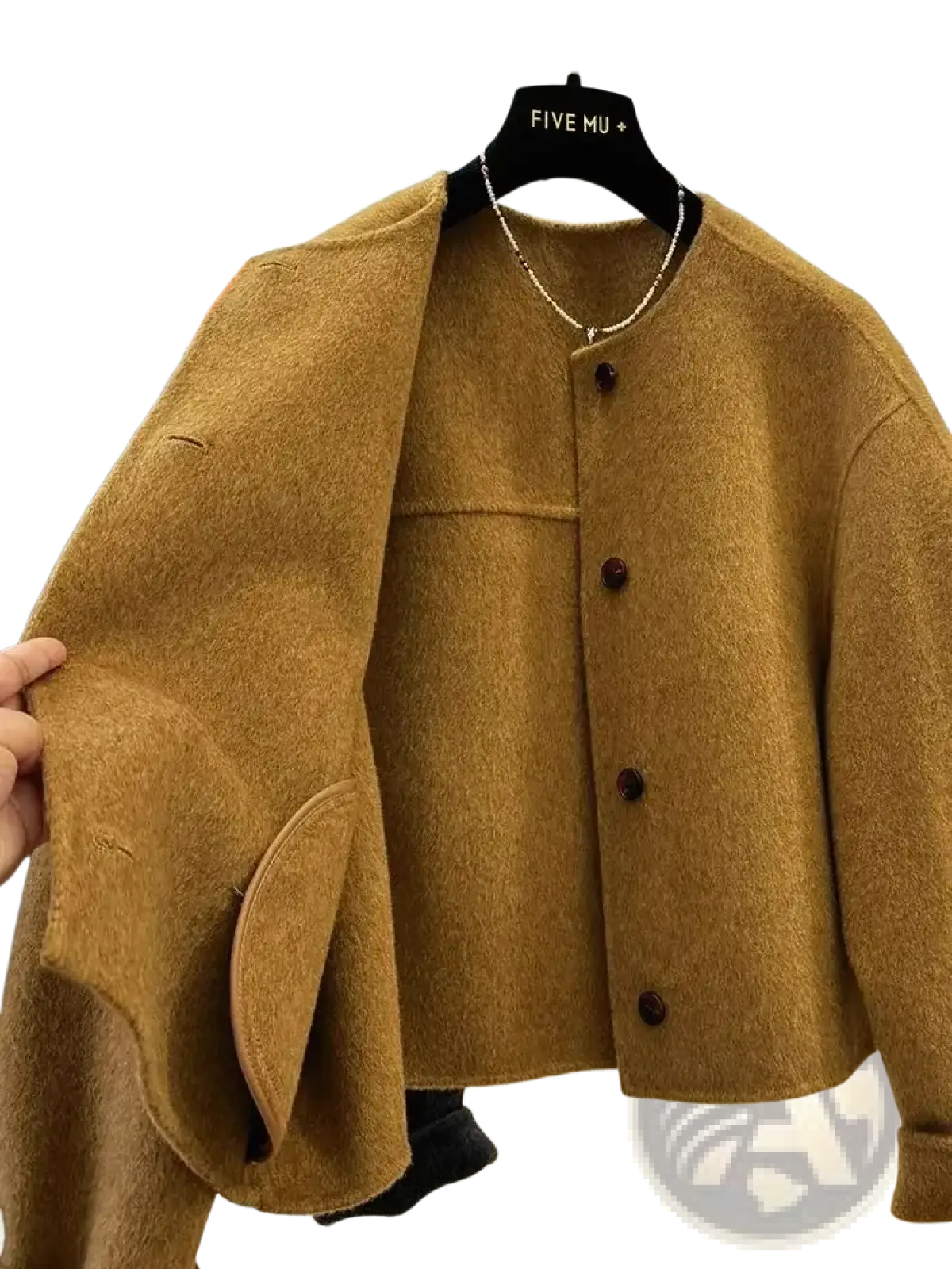 A warm camel-colored wool blend short coat for women with a soft textured finish and dark brown buttons