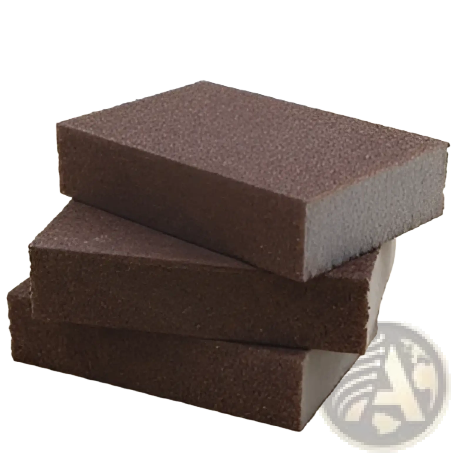 Three dark brown rectangular nano emery sponge abrasive rust and stain remover pads stacked on a wooden surface