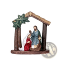 Detailed resin nativity set featuring mary in red dress, joseph in blue robes, and baby jesus under wooden stable arch