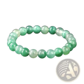 A natural African jade bead bracelet with smooth round beads in varying translucent green and white shades unisex gemstone