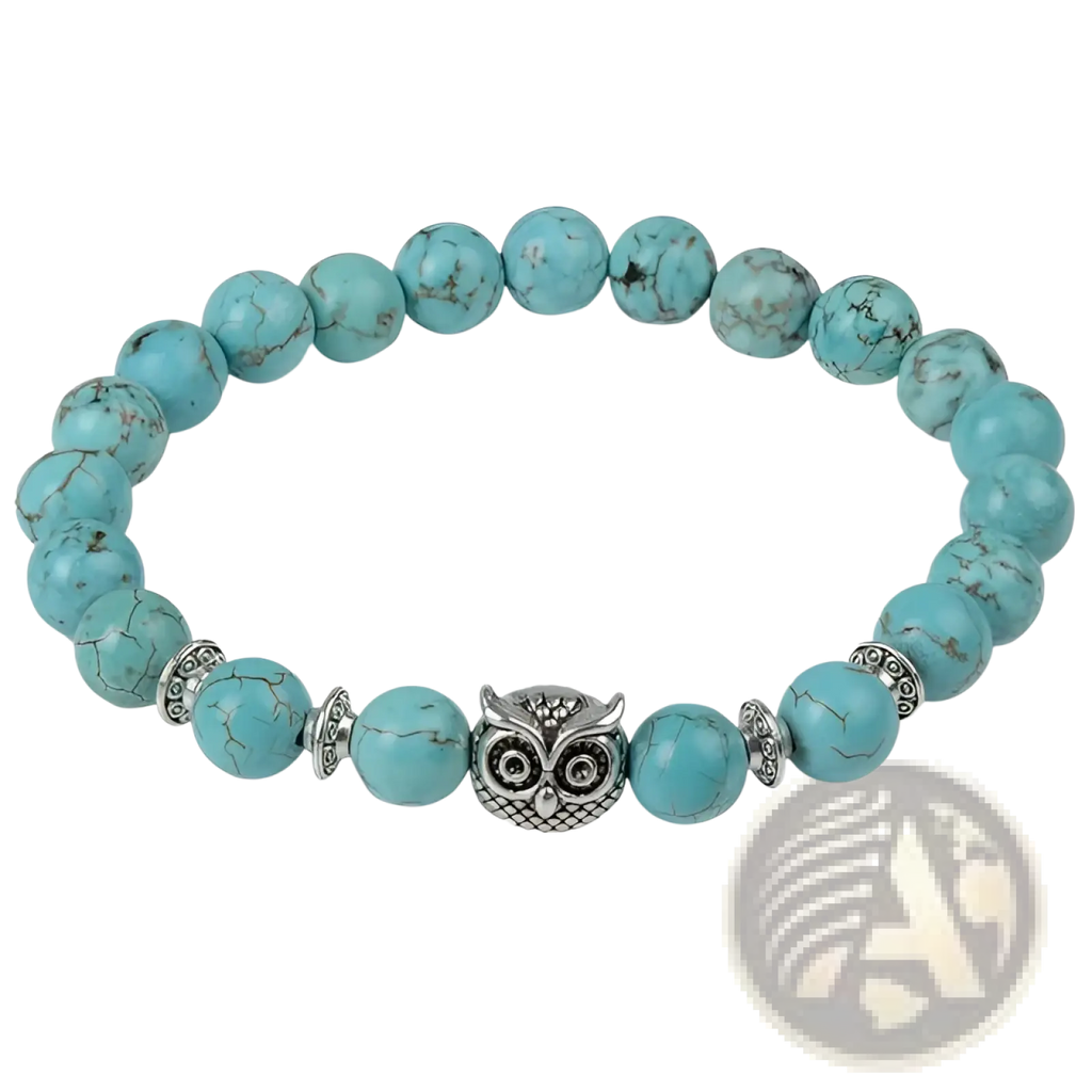 Turquoise beaded bracelet with natural lapis lazuli and lava stone featuring a central silver owl charm and metallic spacers