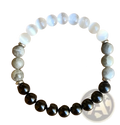 Natural multi-gemstone beaded bracelet with healing crystals featuring white moonstone, gray labradorite, and black onyx beads