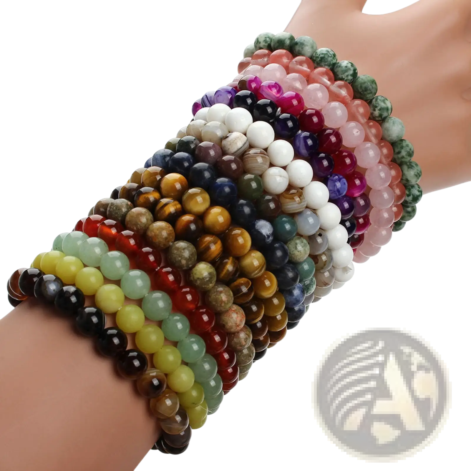 Natural polished gemstone and agate beaded bracelets in colorful round shapes stacked on a wrist