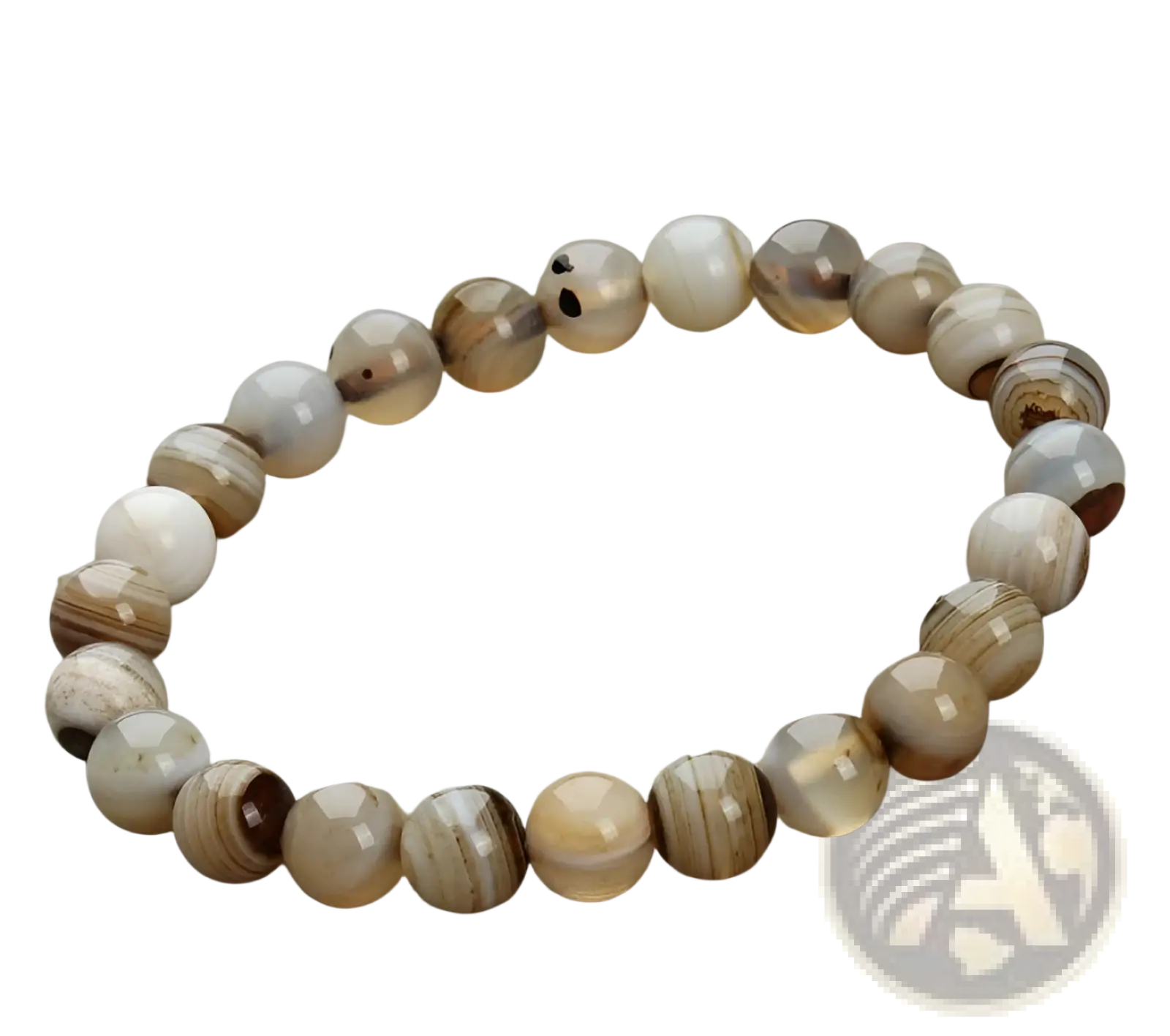 A natural polished gemstone and agate beaded bracelet with smooth round stones in beige brown and cream tones