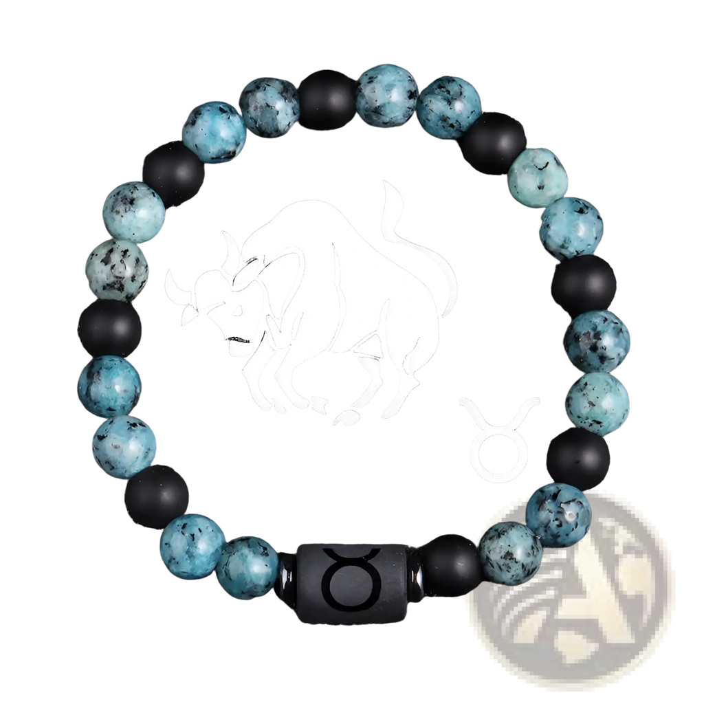 A Taurus zodiac-themed natural stone obsidian bracelet with alternating teal and black beads and engraved central bead