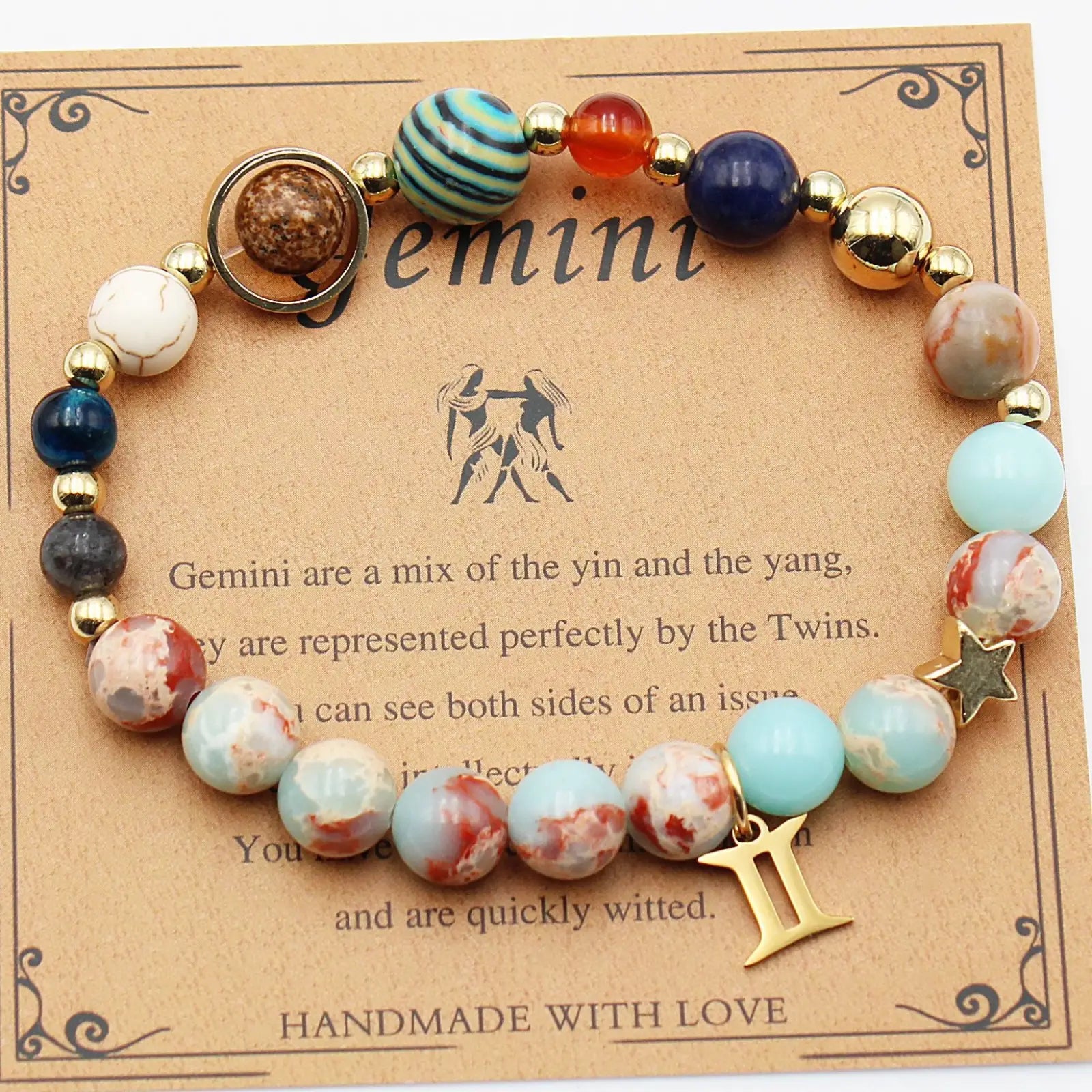 A gemini-themed natural stone beaded bracelet with turquoise red and blue stones and gold-toned zodiac charms