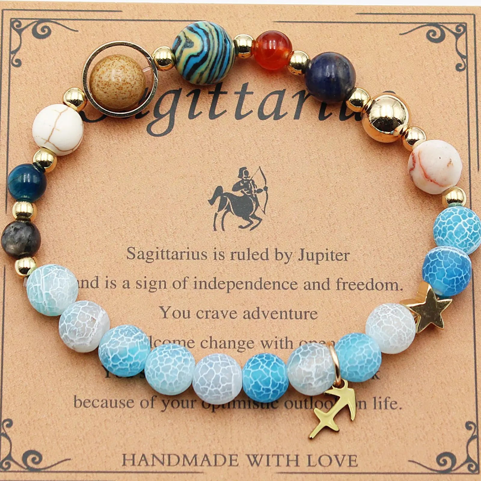 A natural stone twelve zodiac constellation beaded bracelet with blue white gold beads and a sagittarius star charm