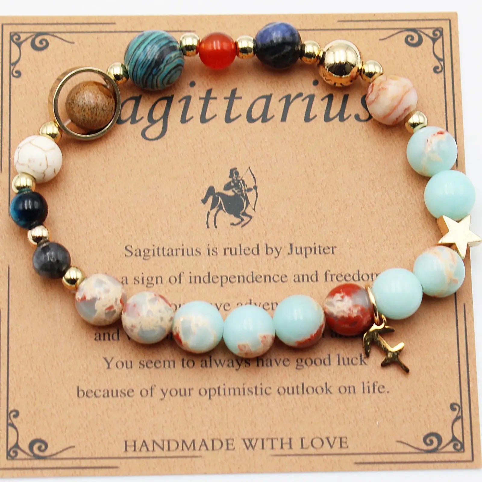 A sagittarius-themed natural stone beaded bracelet with turquoise red and dark blue stones and gold-toned accents