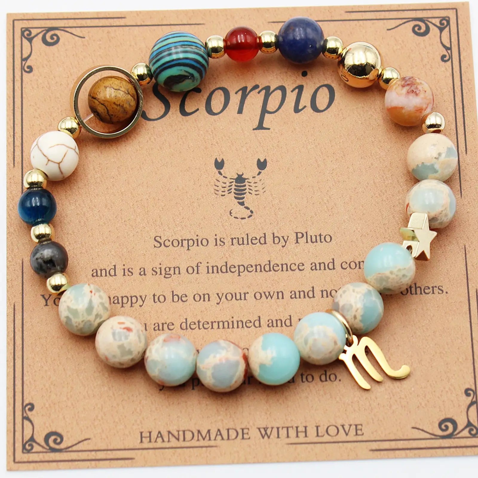 A handmade scorpio zodiac bracelet with colorful polished gemstone beads and gold-toned metal charms from natural stone twelve zodiac constellation beaded bracelet