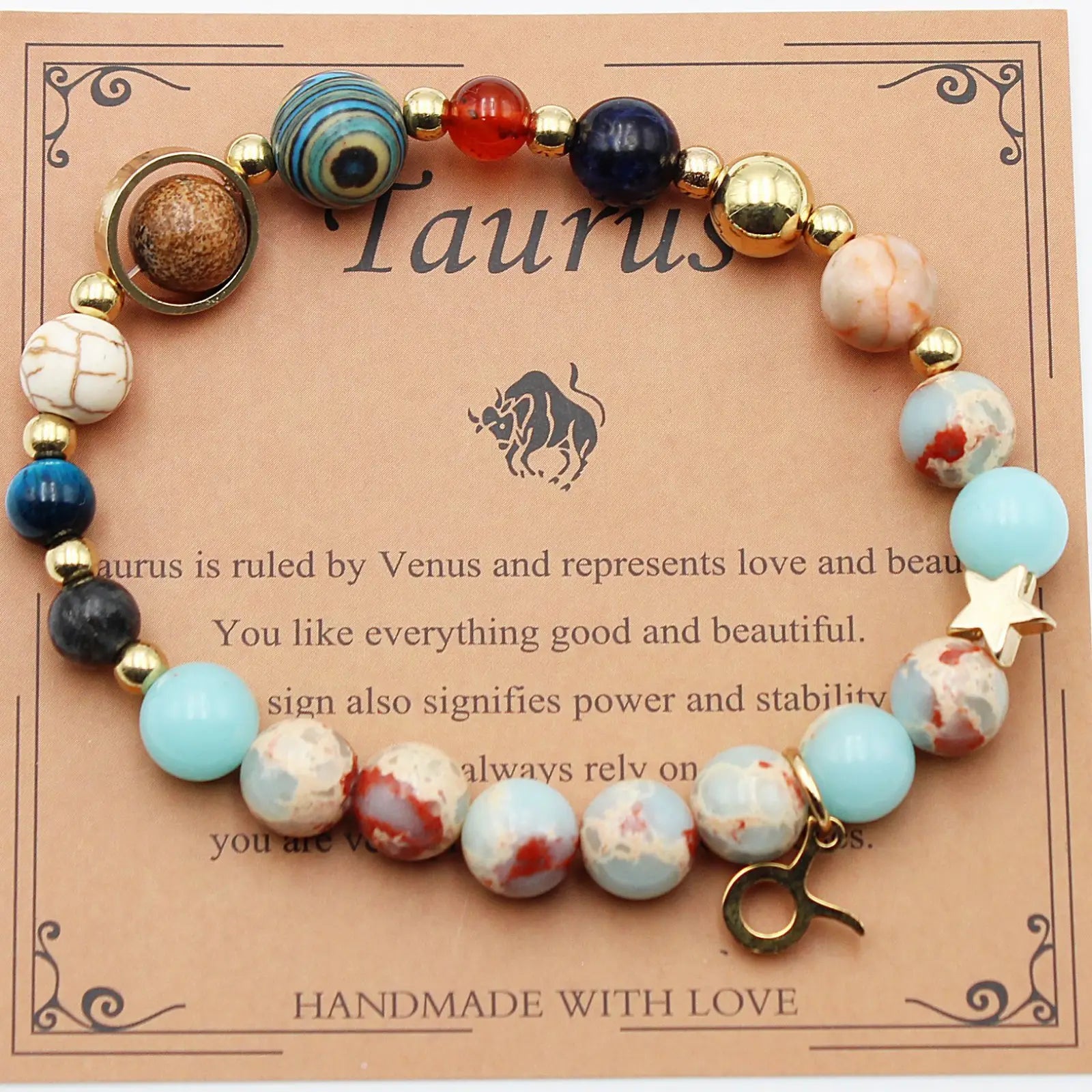 A taurus zodiac-themed natural stone beaded bracelet with turquoise, blue, marbled beads and gold-toned accents