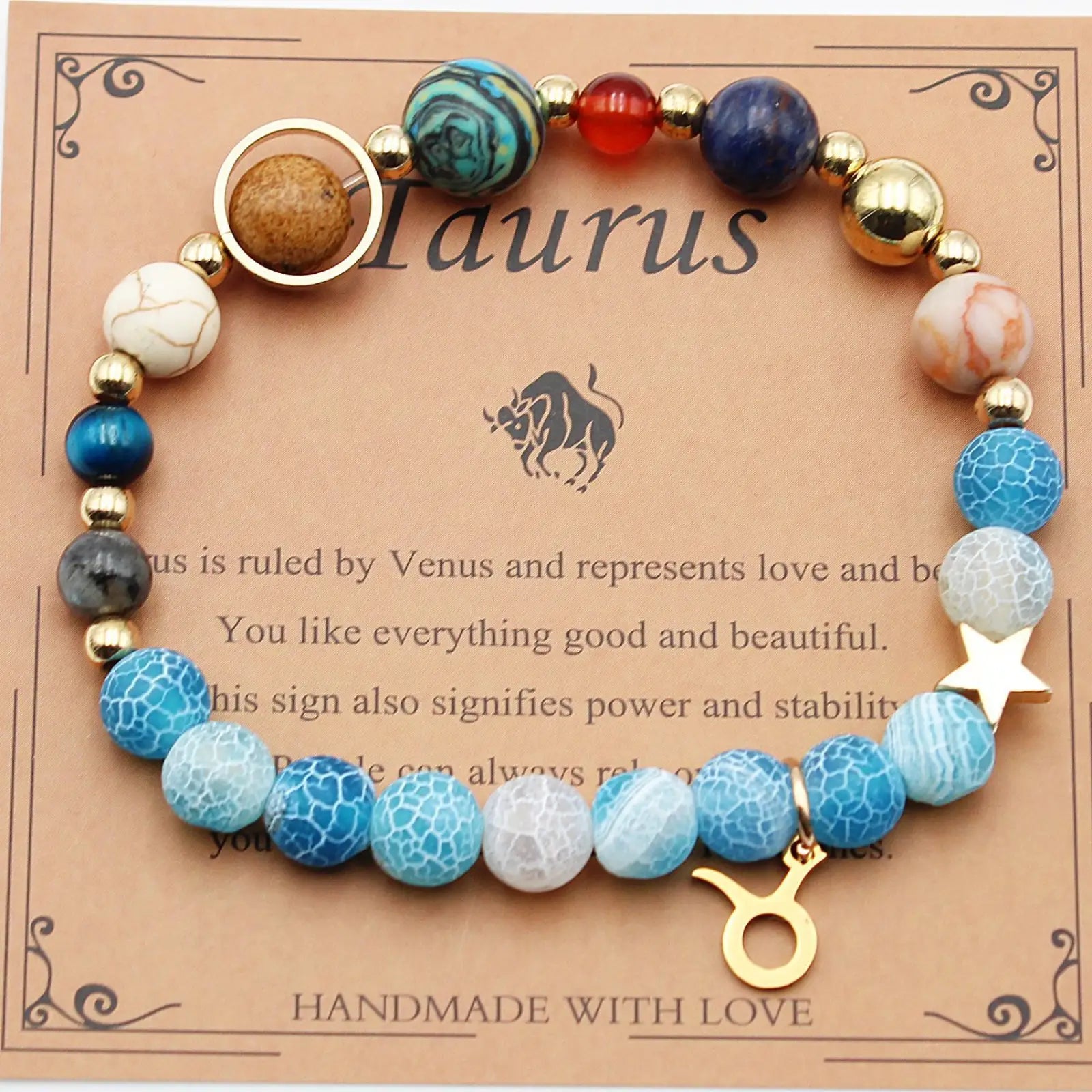 A natural stone twelve zodiac constellation beaded bracelet with blue white and gold beads and a golden taurus charm